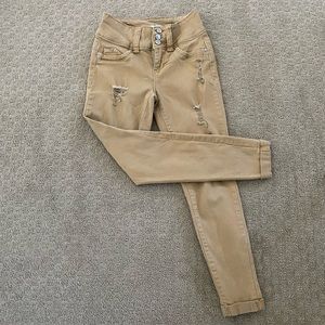 YMI Juniors’ Nude Yellow Ripped Skinny Jeans